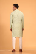 This Pista Green chikankari kurta from Ekyaa combines delicate craftsmanship with modern sophistication. Made from premium viscose rayon, the kurta offers a soft, skin-friendly feel with an elegant fall that flatters your silhouette. The intricate chikankari embroidery, enhanced with transparent sequin detailing, adds a refined touch, while the concealed buttons and tone-on-tone embroidery on the placket and sleeves give it a clean, seamless look.