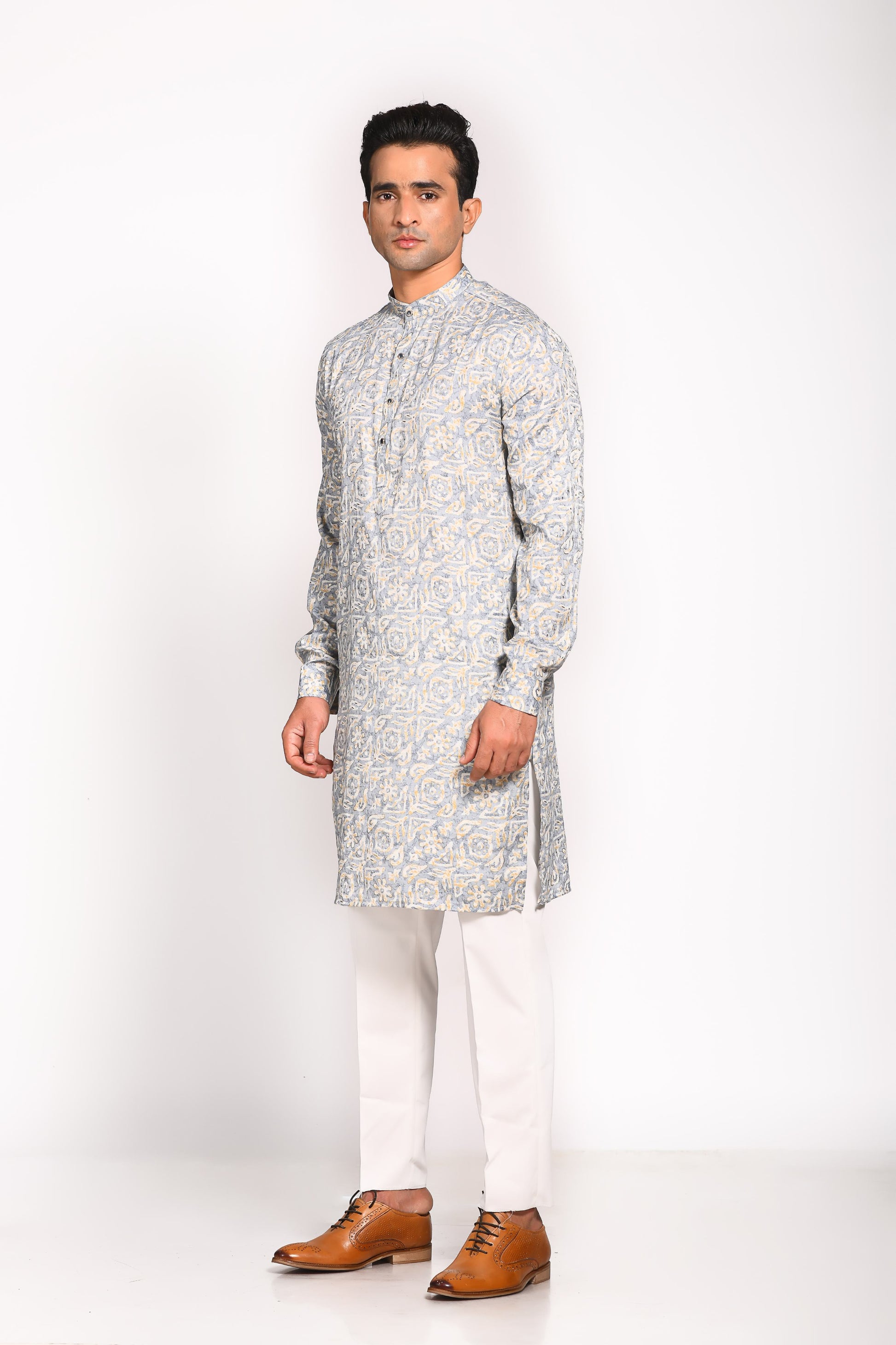 Introducing our Ash Blue Mull Cotton Digital Print Kurta, specially designed for maximum comfort and ease. Crafted from breathable mull cotton, this kurta is highly recommended for the warmer months, ensuring you stay cool and stylish, whether it’s a festive occasion or a casual day out. The slim fit cut and elegant digital print bring together tradition and modernity, making this a versatile piece for any occasion.&nbsp;