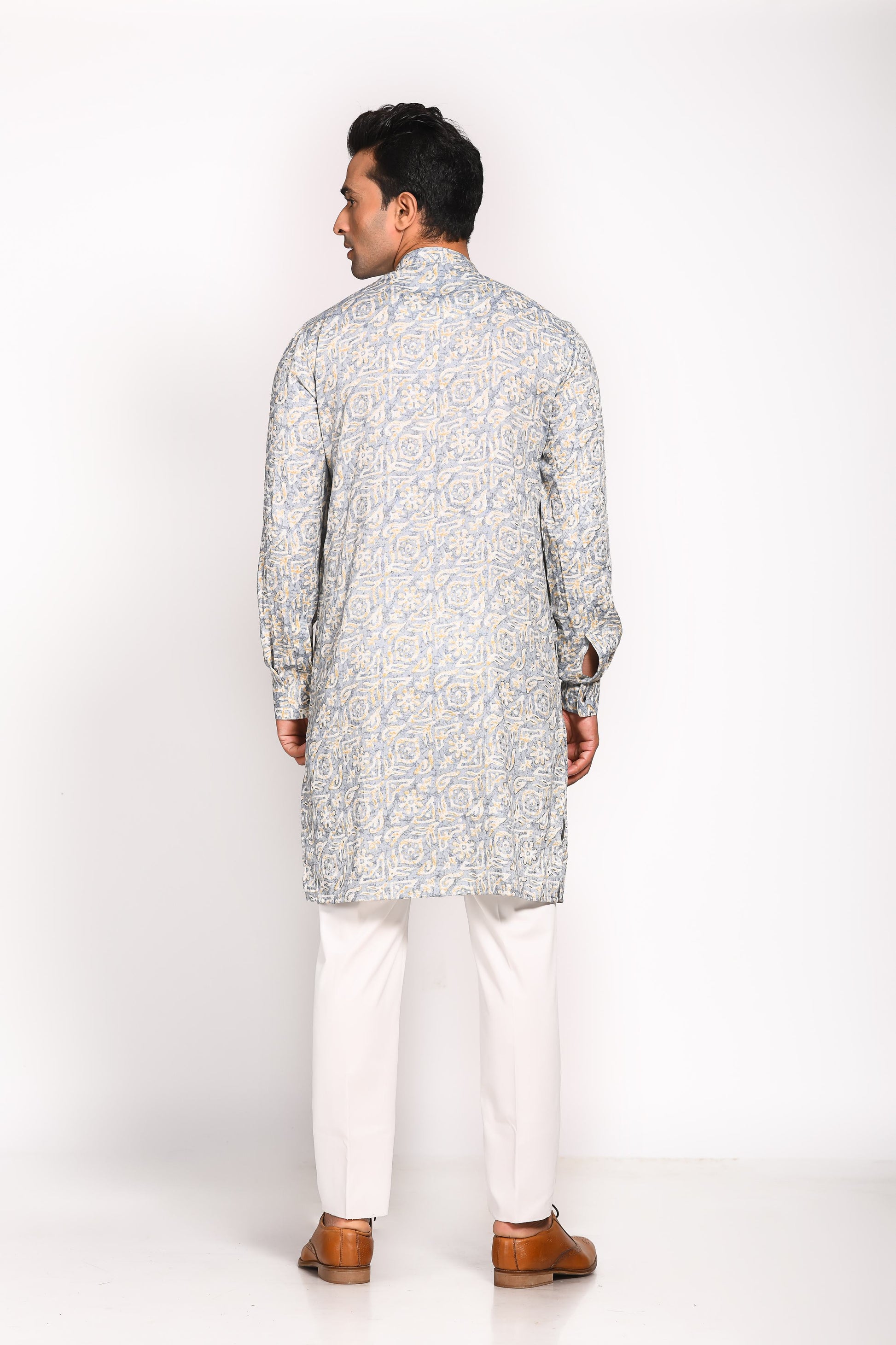 Introducing our Ash Blue Mull Cotton Digital Print Kurta, specially designed for maximum comfort and ease. Crafted from breathable mull cotton, this kurta is highly recommended for the warmer months, ensuring you stay cool and stylish, whether it’s a festive occasion or a casual day out. The slim fit cut and elegant digital print bring together tradition and modernity, making this a versatile piece for any occasion.&nbsp;