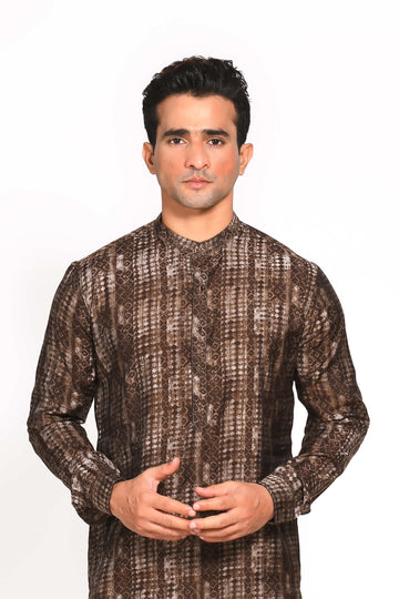 Introducing our Digital Print Kurta, specially designed for maximum comfort and ease. Crafted from breathable Muslin, this kurta is highly recommended for the warmer months, ensuring you stay cool and stylish, whether it’s a festive occasion or a casual day out. The slim fit cut and elegant digital print bring together tradition and modernity, making this a versatile piece for any occasion.