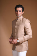 Introducing  our Beige Bandhgala Jacket, designed for the modern man who values style and comfort. Crafted from imported terry rayon fabric, this jacket boasts a soft, smooth feel with a plain weave that adds a touch of understated elegance. The slim fit ensures a sleek silhouette, making it perfect for special occasions or formal gatherings. The inside is lined with premium jacquard fabric, providing a luxurious feel and added durability. 
