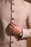 Introducing  our Beige Bandhgala Jacket, designed for the modern man who values style and comfort. Crafted from imported terry rayon fabric, this jacket boasts a soft, smooth feel with a plain weave that adds a touch of understated elegance. The slim fit ensures a sleek silhouette, making it perfect for special occasions or formal gatherings. The inside is lined with premium jacquard fabric, providing a luxurious feel and added durability. 