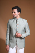 Introducing our Mint Green Bandhgala Jacket, designed for the modern man who values style and comfort. Crafted from imported terry rayon fabric, this jacket boasts a soft, smooth feel with a plain weave that adds a touch of understated elegance. The slim fit ensures a sleek silhouette, making it perfect for special occasions or formal gatherings. The inside is lined with premium jacquard fabric, providing a luxurious feel and added durability. 