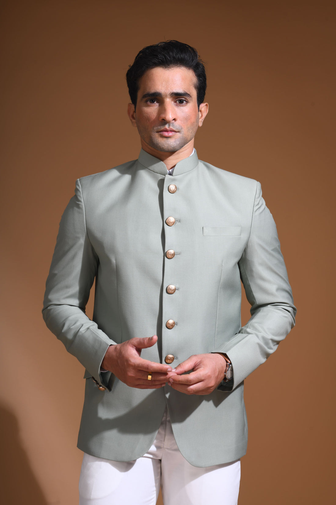 Introducing  our Mint Green Bandhgala Jacket, designed for the modern man who values style and comfort. Crafted from imported terry rayon fabric, this jacket boasts a soft, smooth feel with a plain weave that adds a touch of understated elegance. The slim fit ensures a sleek silhouette, making it perfect for special occasions or formal gatherings. The inside is lined with premium jacquard fabric, providing a luxurious feel and added durability. 