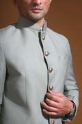 Introducing  our Mint Green Bandhgala Jacket, designed for the modern man who values style and comfort. Crafted from imported terry rayon fabric, this jacket boasts a soft, smooth feel with a plain weave that adds a touch of understated elegance. The slim fit ensures a sleek silhouette, making it perfect for special occasions or formal gatherings. The inside is lined with premium jacquard fabric, providing a luxurious feel and added durability. 