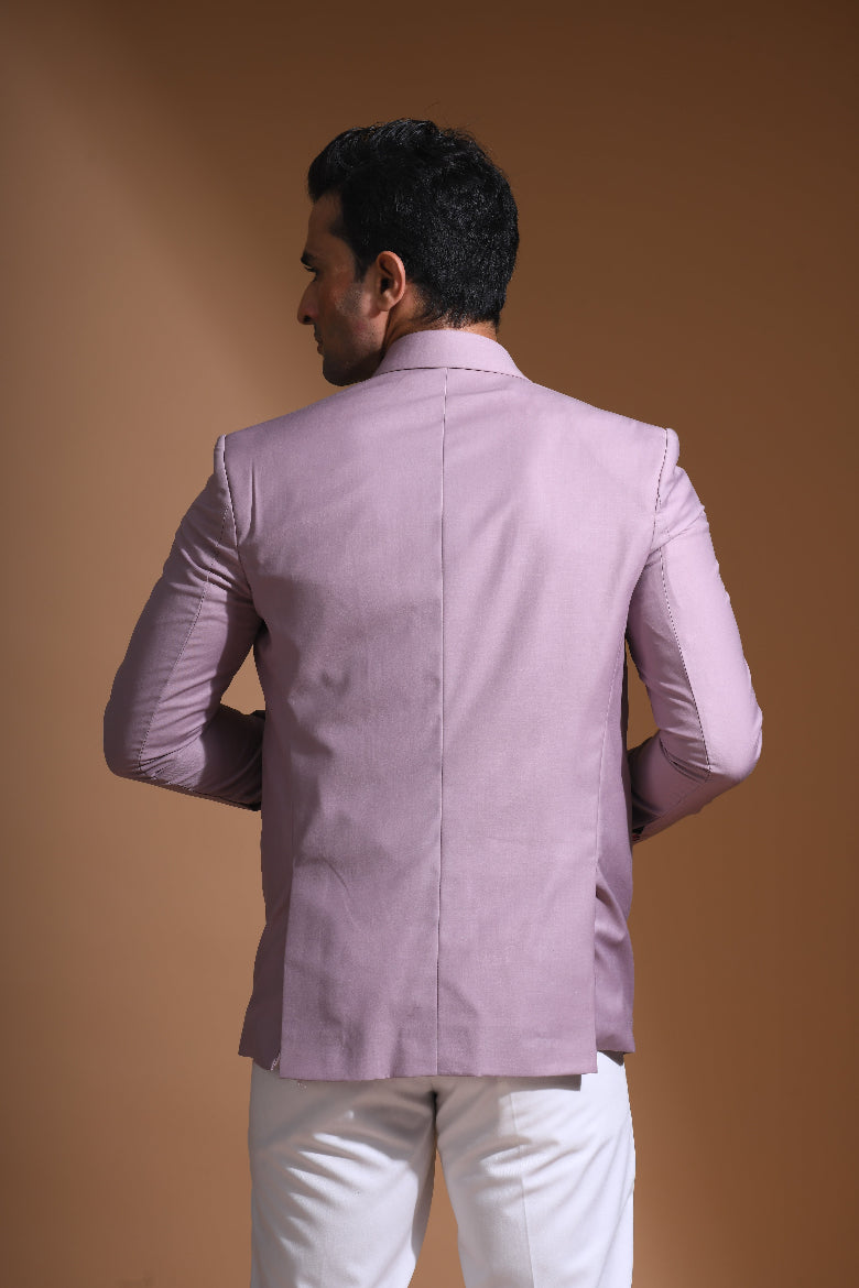  Introducing our Onion Pink Bandhgala Jacket, designed for the modern man who values style and comfort. Crafted from imported terry rayon fabric, this jacket boasts a soft, smooth feel with a plain weave that adds a touch of understated elegance. The slim fit ensures a sleek silhouette, making it perfect for special occasions or formal gatherings. The inside is lined with premium jacquard fabric, providing a luxurious feel and added durability. 