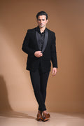 Introducing our stunning Black Tuxedo Jacket, designed to exude sophistication and class. Made from imported stretchable crepe fabric, this tuxedo jacket offers both a luxurious look and the utmost comfort in movement. The rich Black color, paired with a standard tuxedo lapel and a sleek single-button front fastening, makes this piece perfect for formal events. The premium jacquard lining inside adds a touch of refinement, while contrasting buttons on the front and sleeves enhance its  elegance. 